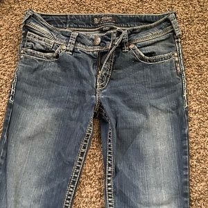 Woman’s silver jeans!